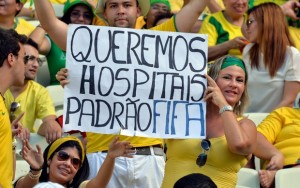 cartaz4_protesto_brasil_mexico_afp