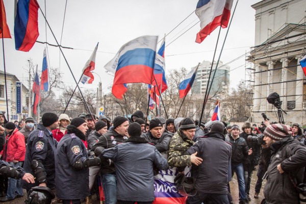 Protestors gather outside parliament building in Crimea