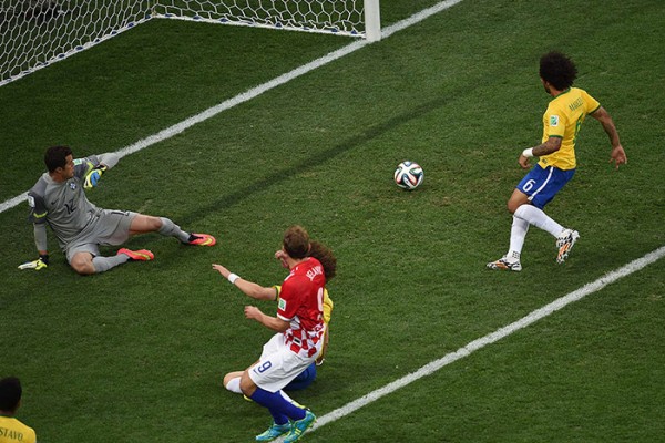 Brazil's defender Marcelo (TOP) scores a