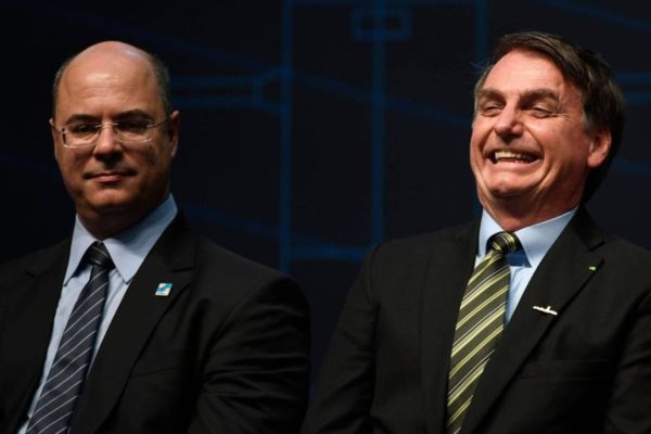 O governador Wilson Witzel e o presidente Jair Bolsonaro - Mauro Pimentel/AFP