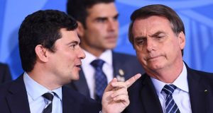 Sergio Moro e Jair Bolsonaro em cerimônia no Palácio do Planalto