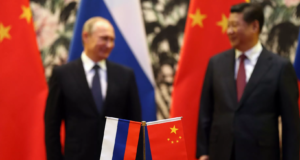 Os presidentes da Rússia e da China, Putin e Xi Jinping. Foto: AFP/How Hwee Young