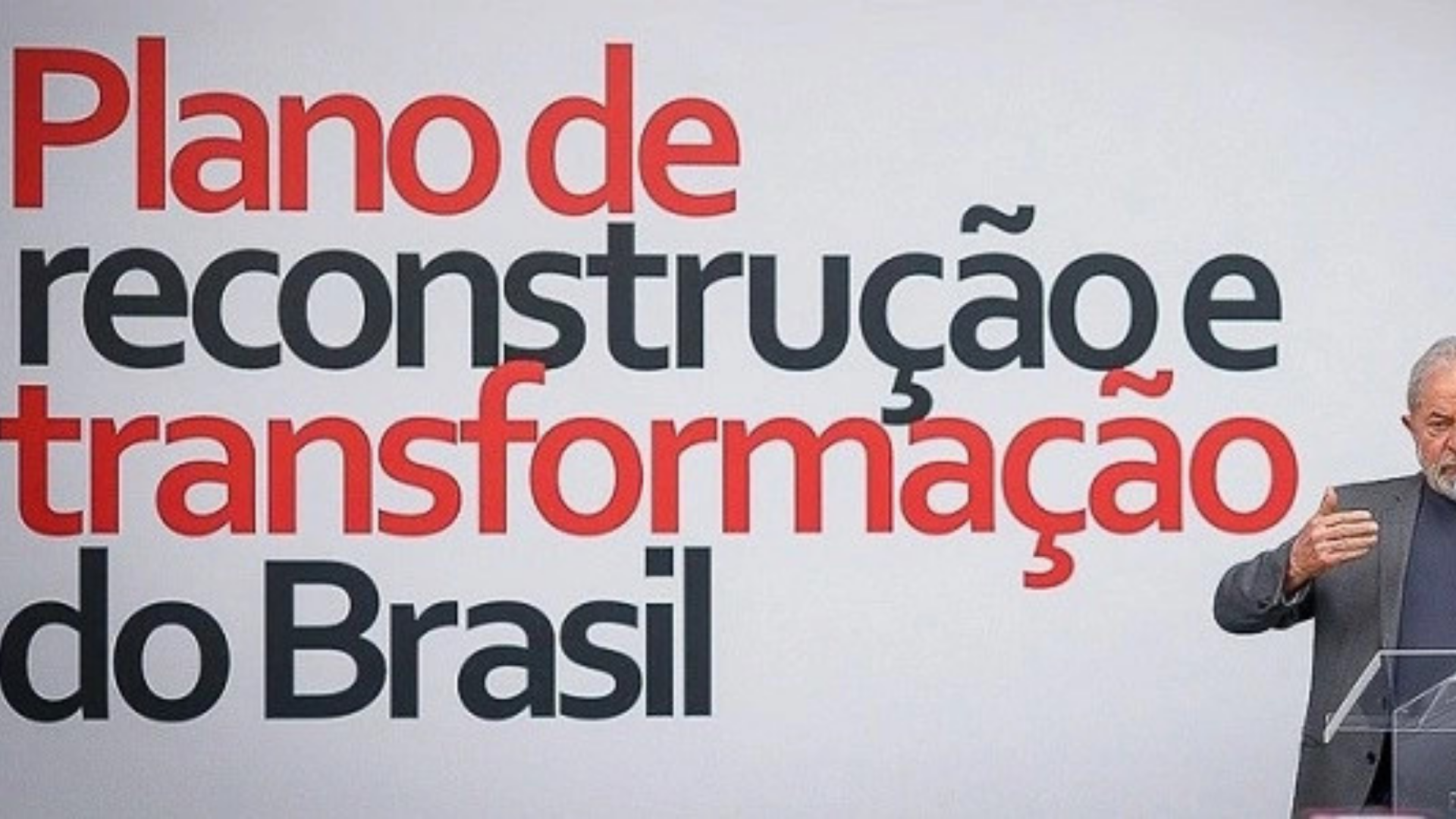A eleição de outubro no Brasil e a urgência da reconstrução nacional. Foto de Lula ao lado de um letreiro com a logo de cmapanha, escrito "Plano de reconstrução e transformação do Brasil".
