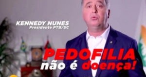 Justiça proíbe circulação de propaganda do PTB que associa esquerda à pedofilia. deputado aparece em print de vídeo usando terno azul e falando. Na tela há escrito a frase "Pedofilia não é doença", que seria supostamente dirigida à esquerda.