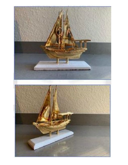 Barco de ouro de luxo fora da caixa