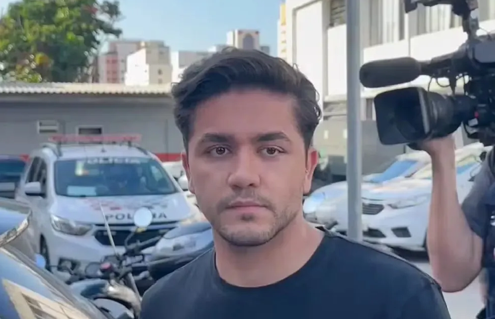 Fernando Sastre de Oliveira Filho de camiseta preta e expressão triste