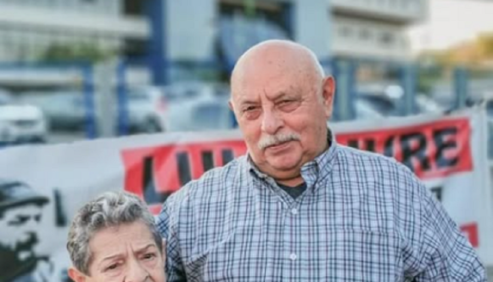 José Ferreira da Silva, conhecido como Frei Chico, de camisa social xadrez, com expressão observadora