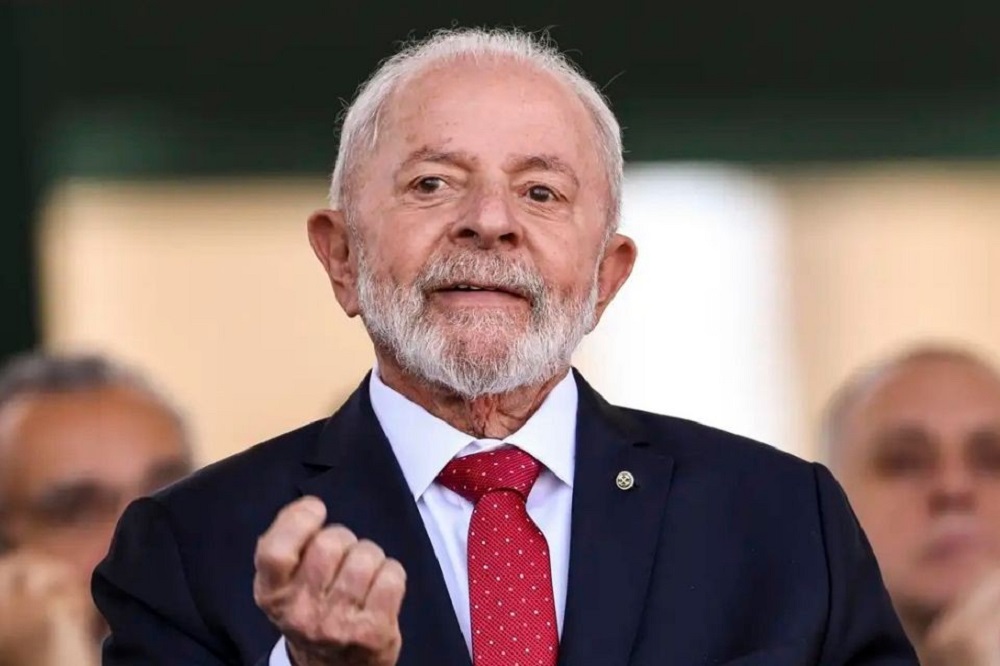 presidente Luiz Inácio Lula da Silva (PT) sorrindo e olhando para o lado