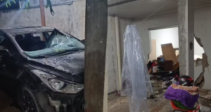 Casa quebrada após homem jogar carro