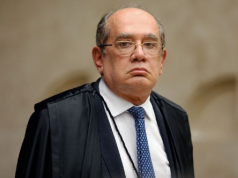 O ministro Gilmar Mendes, do Supremo Tribunal Federal (STF), com expressão séria e óculos