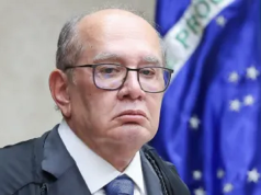 Gilmar Mendes sério, de óculos