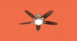 Ventilador de teto em imagem com fundo coral