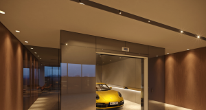 Carro em elevador de luxo