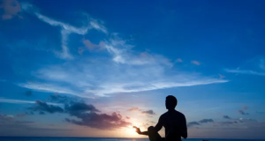 Sombra de homem meditando