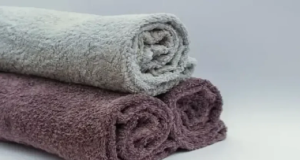 Três toalhas em rolinhos