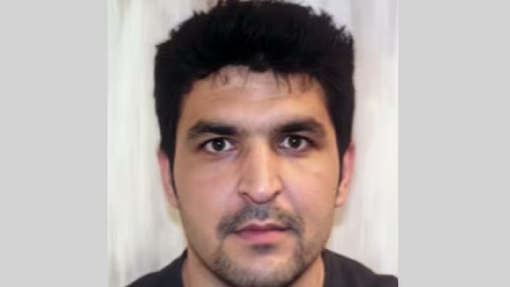 afegão Rahmanullah Lakanwal sério, no centro de montagem