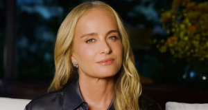 A apresentadora Angélica, olhando pra câmera, de cabelo solto, séria