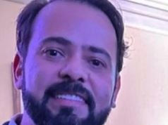 O empresário Alan Cavalcante em close, sorrindo para a câmera