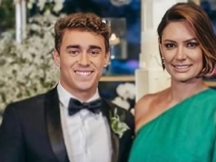 deputado federal Nikolas Ferreira e Michelle Bolsonaro sorrindo lado a lado