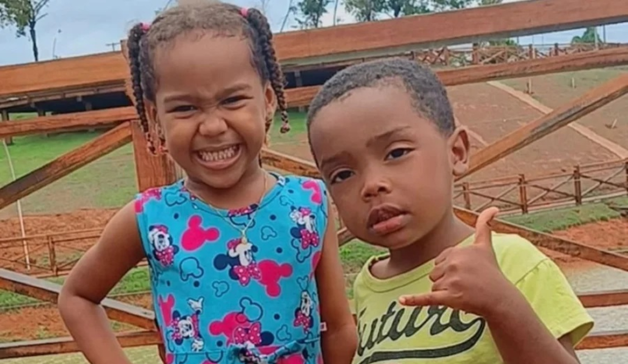 Ágatha Isabelle, de 6 anos, e Allan Michael, de 4. posando para foto lado a lado