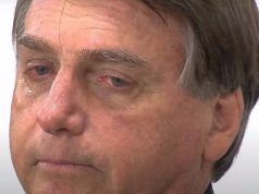 ex-presidente Jair Bolsonaro em close, com cara de choro