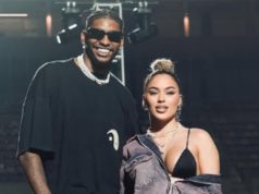 Hugo Souza e Rauany Barcellos posando em pé, lado a lado, ele sorrindo