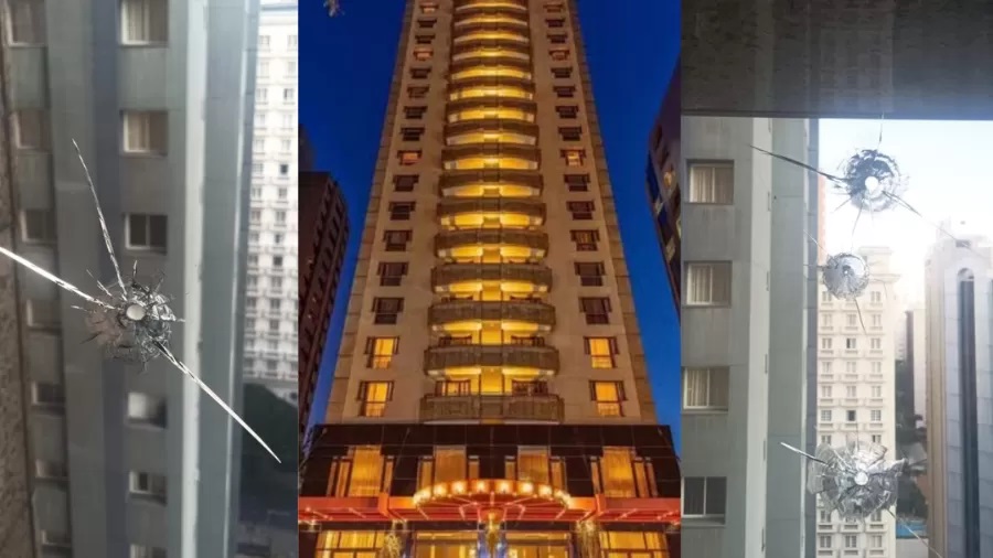 Janelas de hotel com marcas de tiros