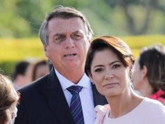 Michelle e Jair Bolsonaro com expressões confusas