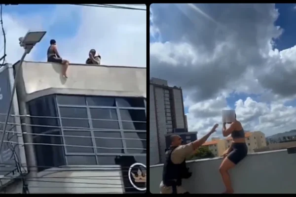 VÍDEO: PM evita queda de mulher que tentava se jogar de prédio
