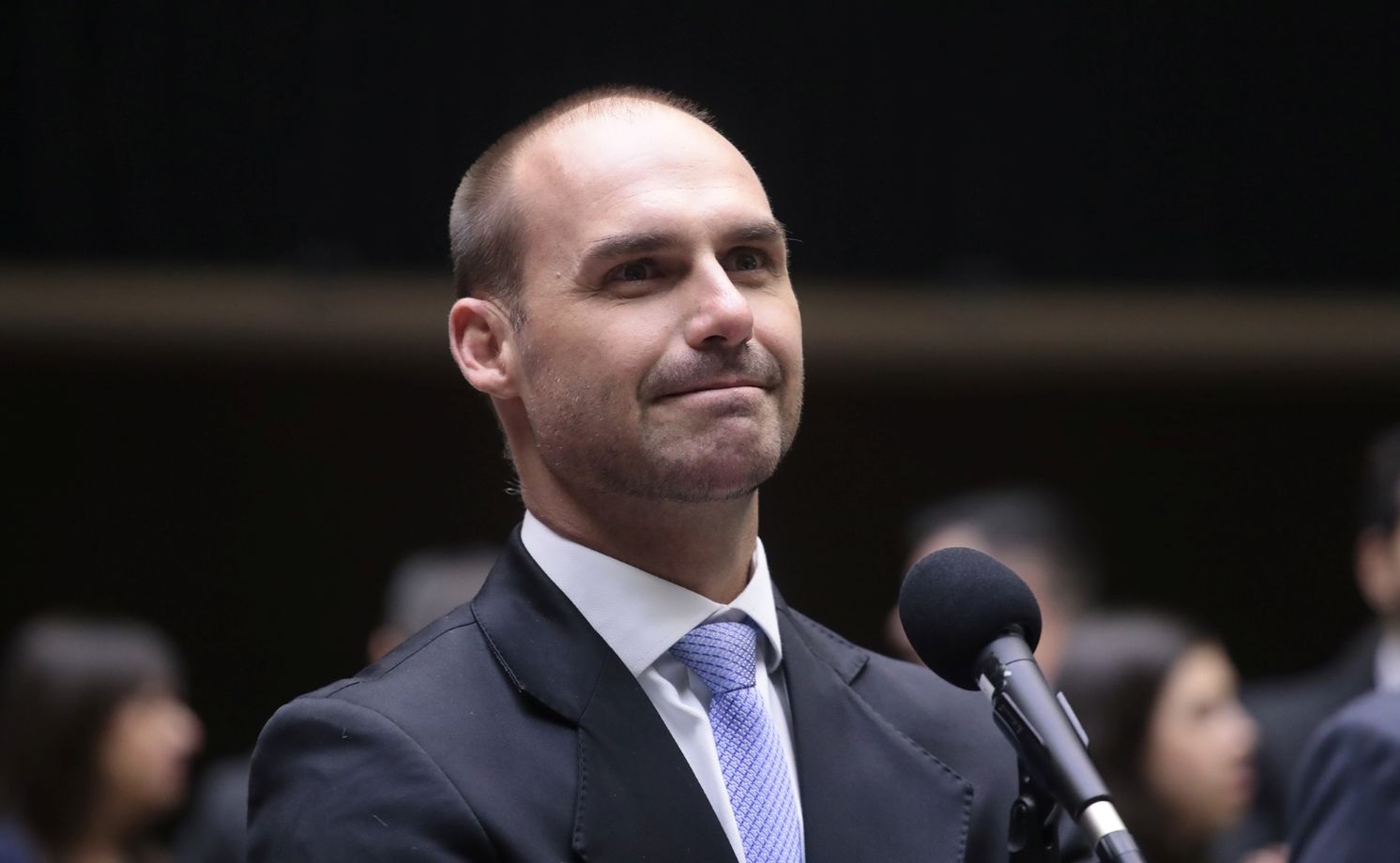 ex-deputado Eduardo Bolsonaro (PL-SP) com expressão de satisfação