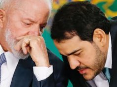 Lula e Jorge Messias conversando ao pé do ouvido