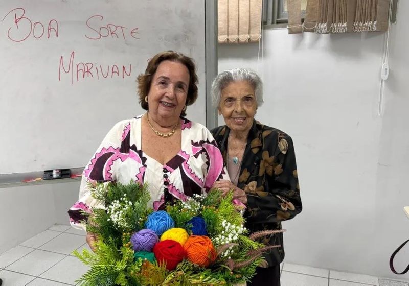 Marivan Ferraro com a mãe, Maria Augusta, durante apresentação de TCC