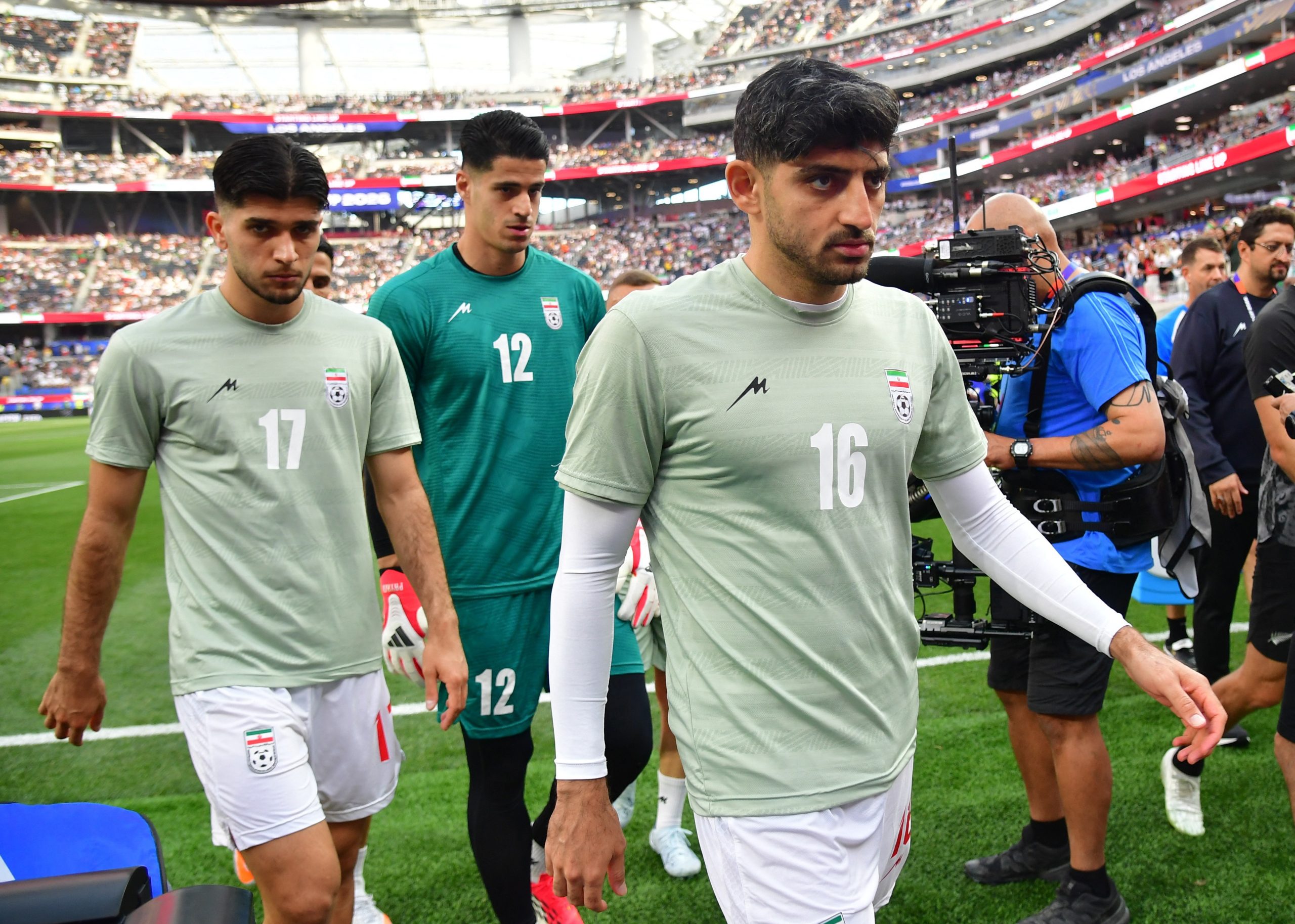Mehdi Torabi durante aquecimento antes de partida contra a Nova Zelândia