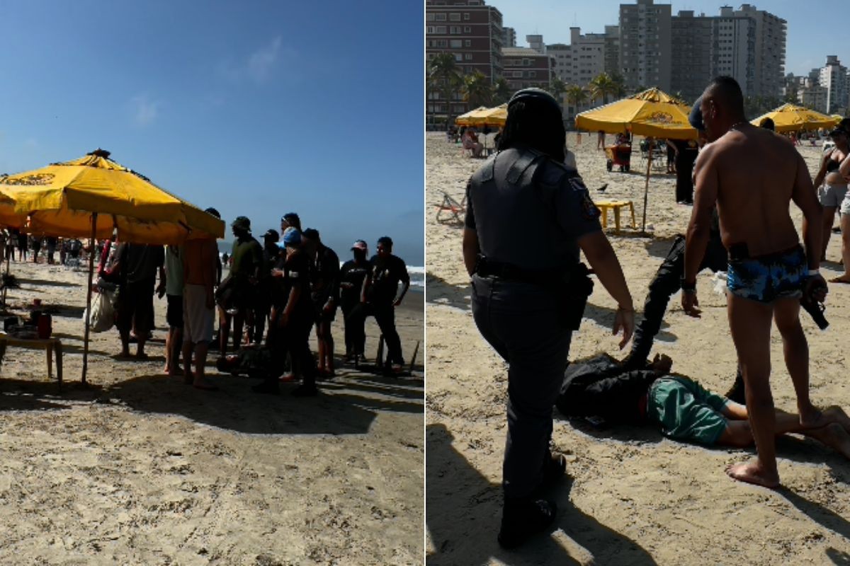 Homem cercado por banhistas na faixa de areia de Praia Grande