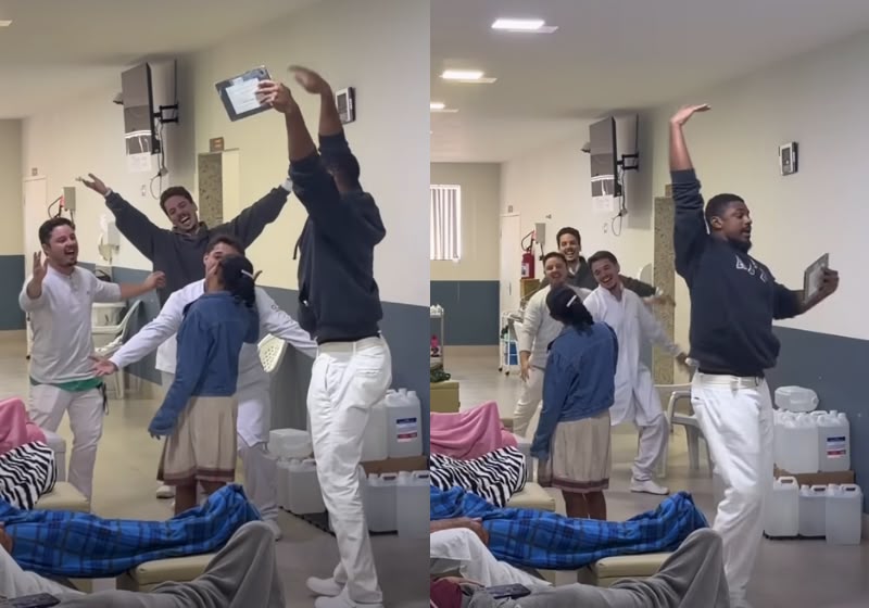 Enfermeiros ao lado de pacientes durante sessão de hemodiálise