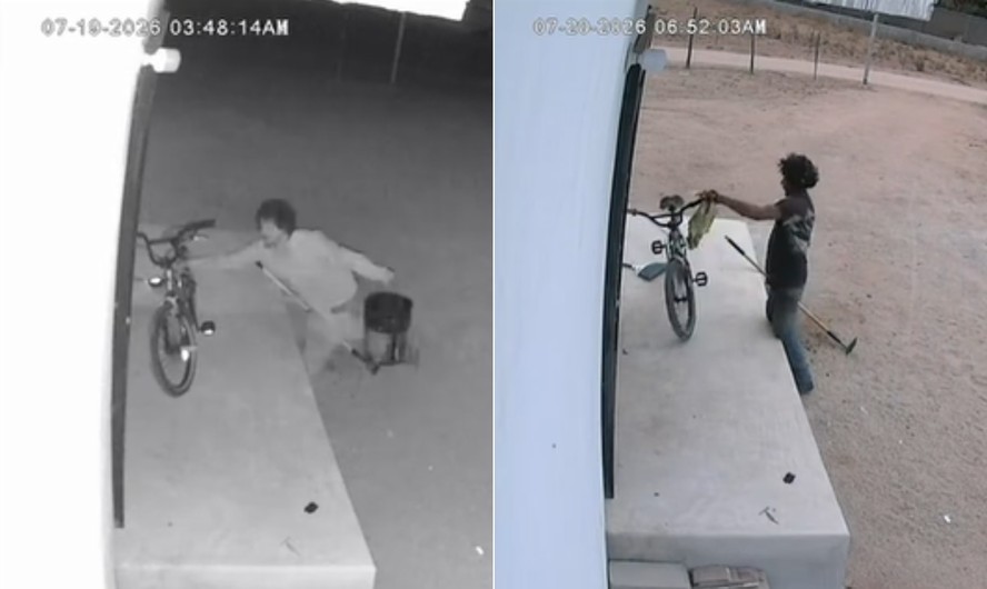 Jovem ao lado de bicicleta em gravação de câmera de segurança