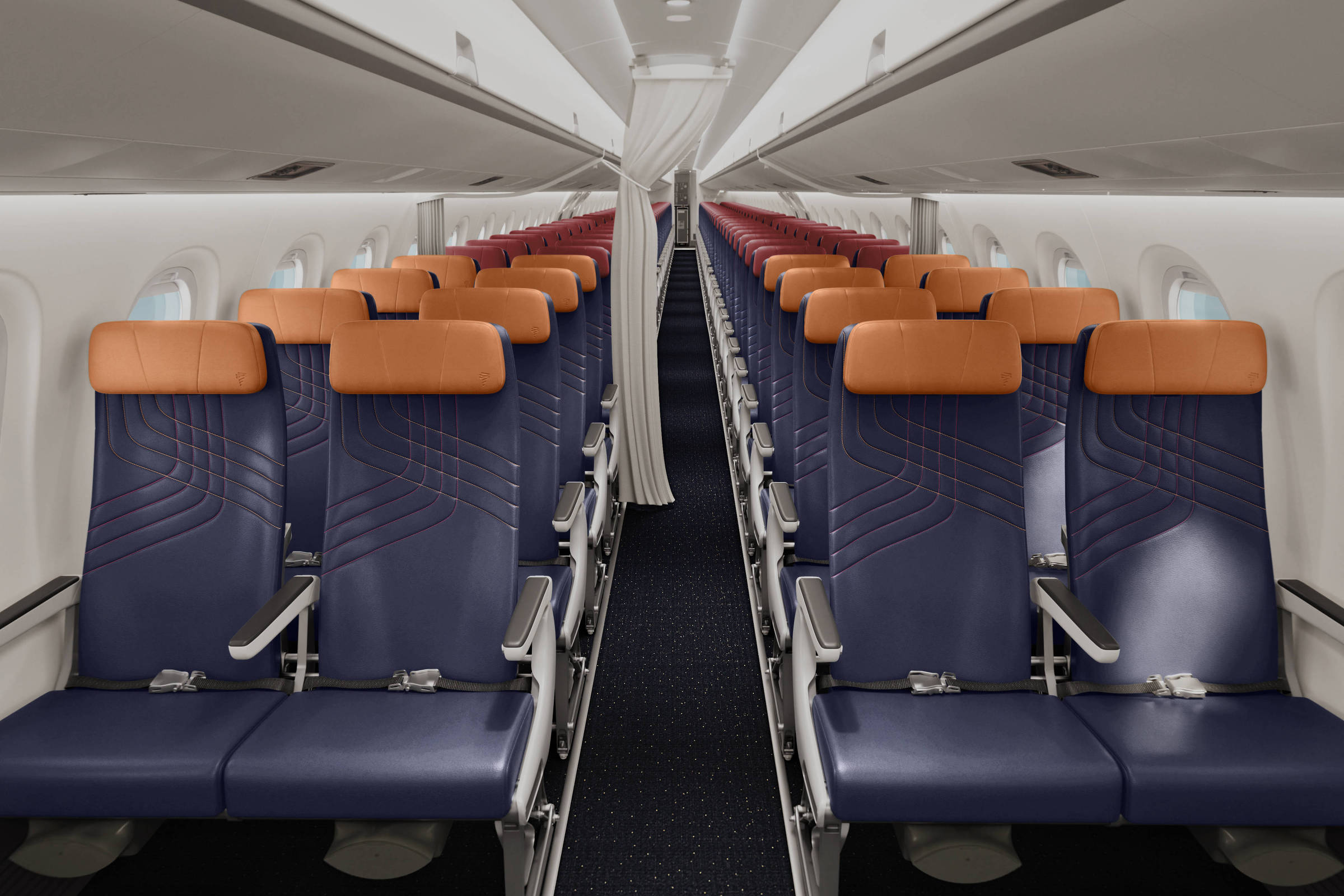 Assentos do Embraer E195-E2 da Latam com encostos de cabeça em cores diferentes