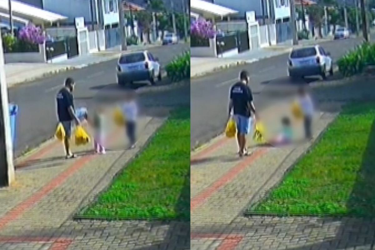 Homem caminhando com duas crianças em Francisco Beltrão