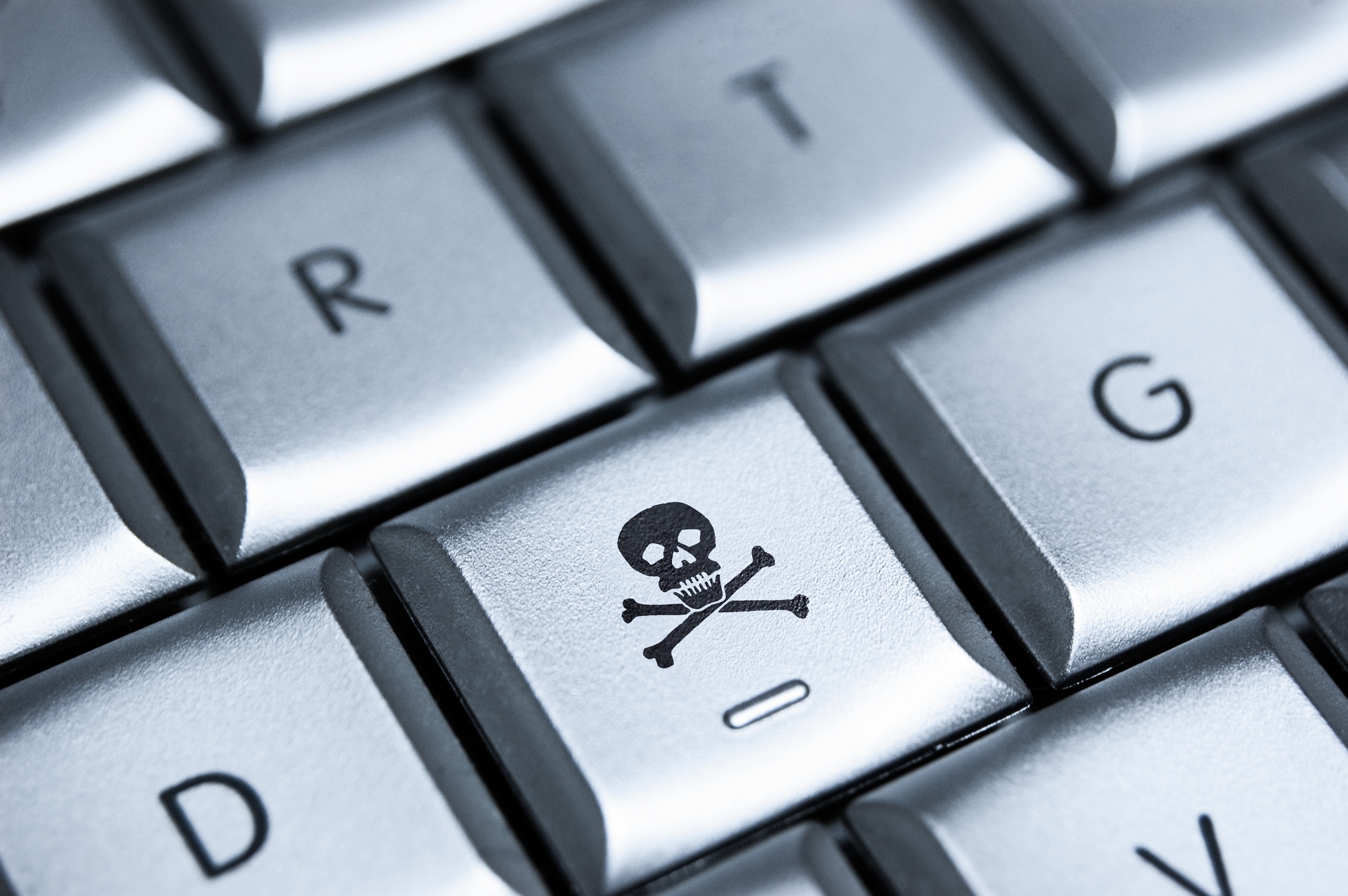 Tecla de computador com símbolo de caveira