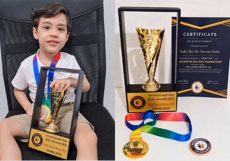Paulo Alex Melo com medalha e troféu de reconhecimento