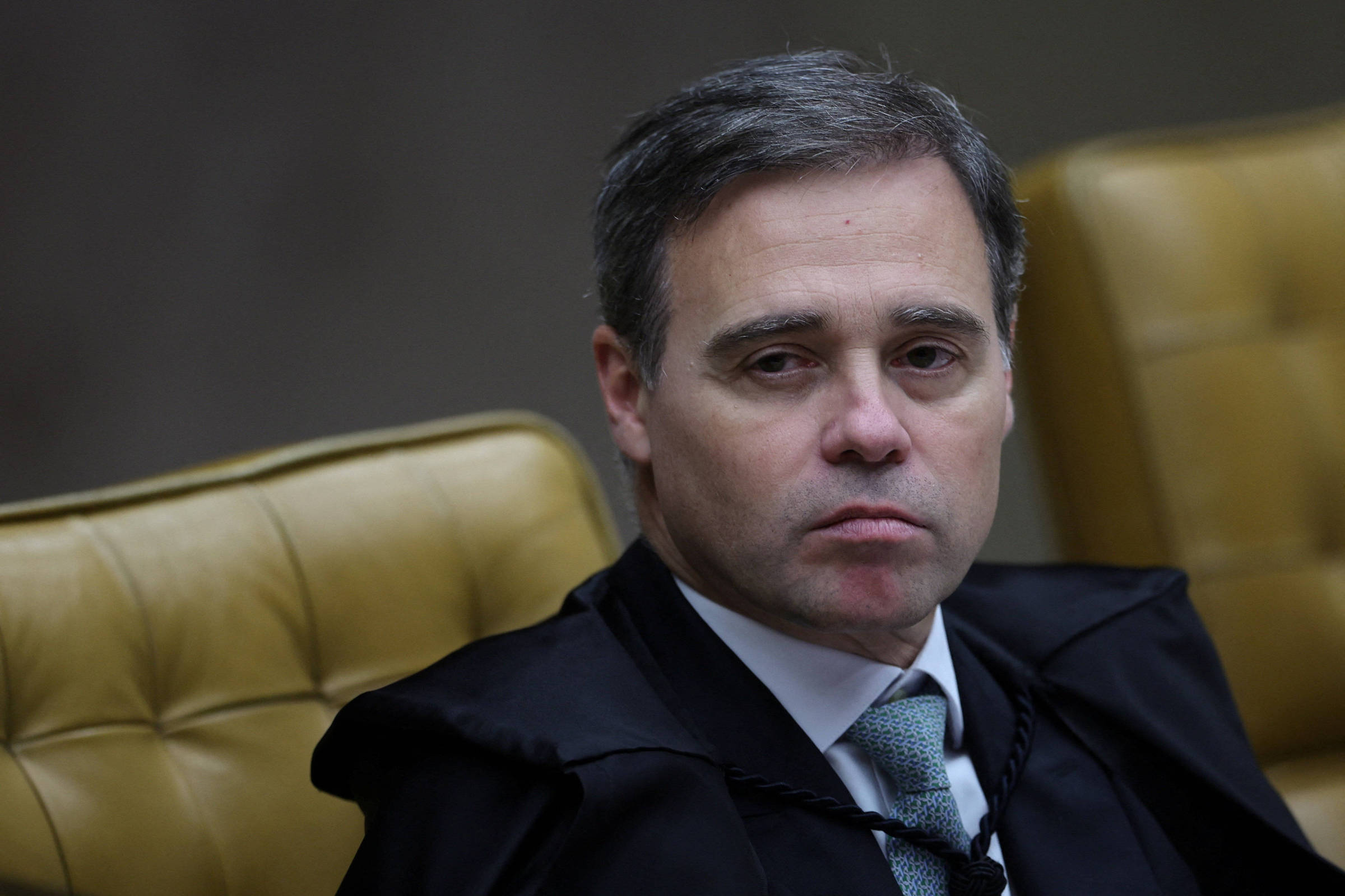 André Mendonça sentado em sessão do Supremo Tribunal Federal
