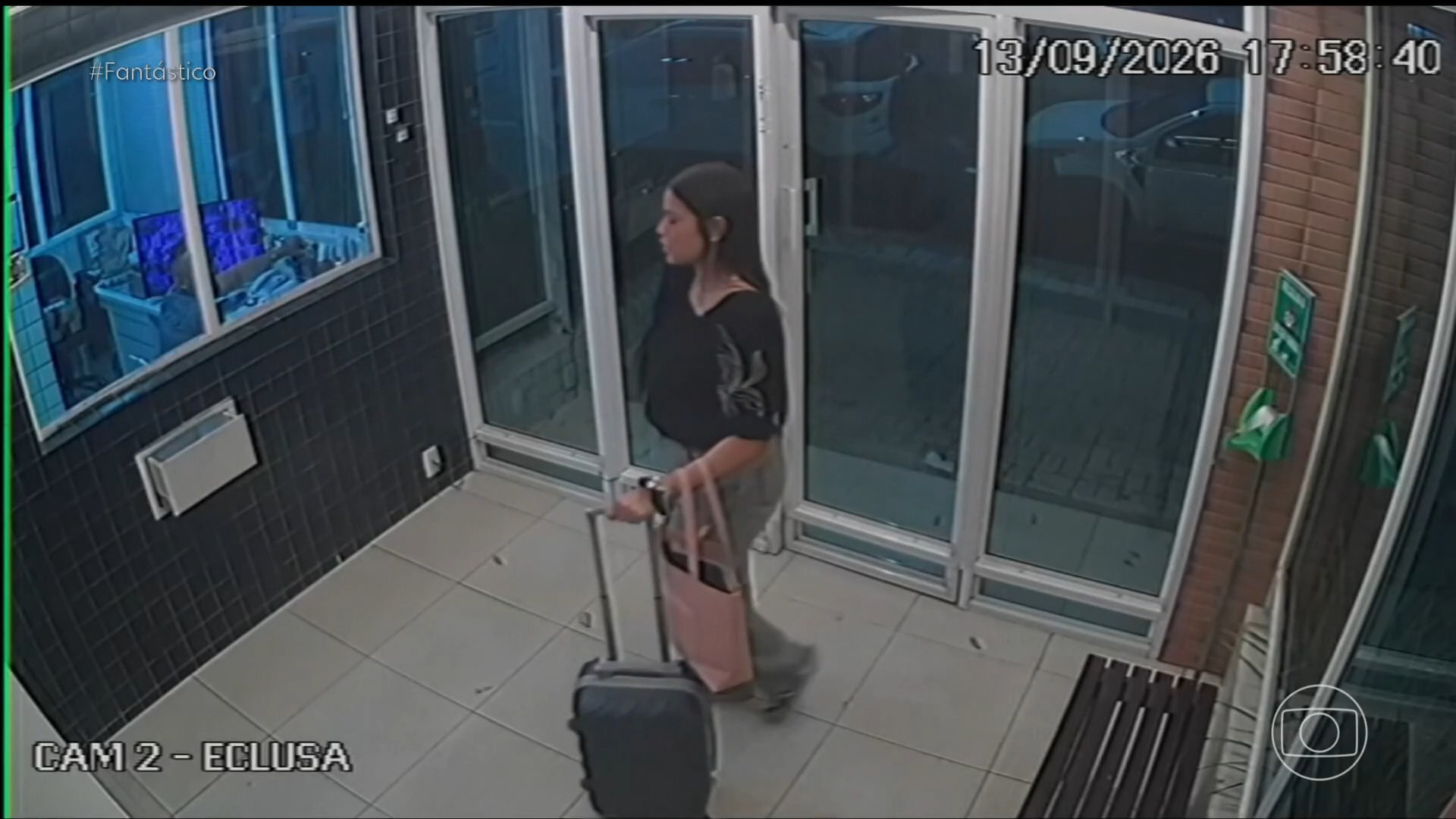 Isabelle Caracristi em imagens de câmera de segurança de condomínio
