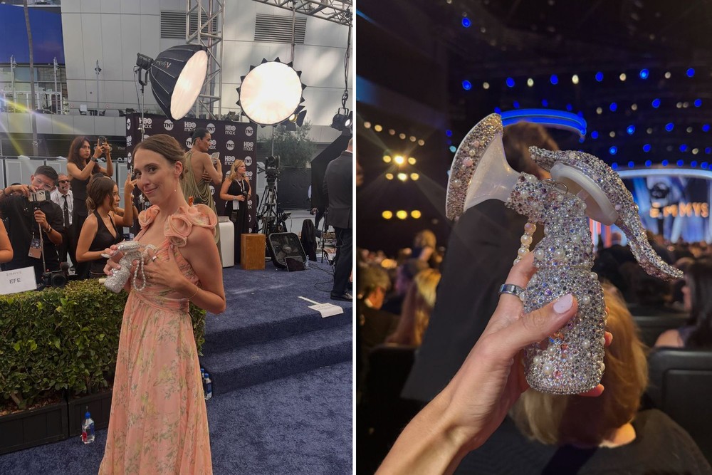 Taylor Cox segura bomba de leite decorada com pedras no Emmy