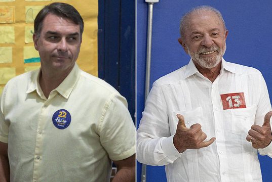 Flávio Bolsonaro e Lula durante a votação do segundo turno de 2026