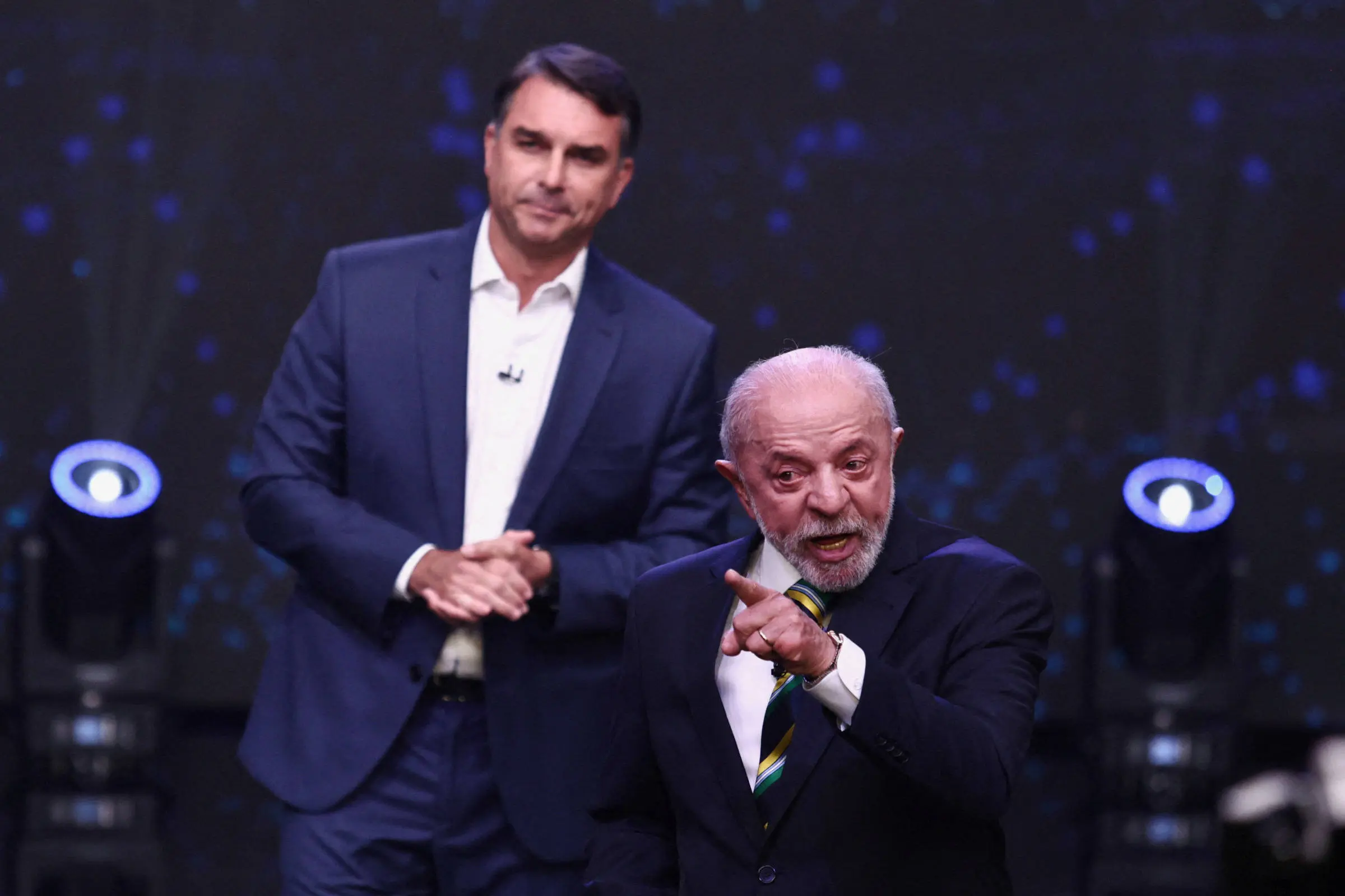Lula e Flávio Bolsonaro no debate presidencial da Band