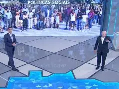 Lula e Flávio Bolsonaro durante debate presidencial na TV Globo