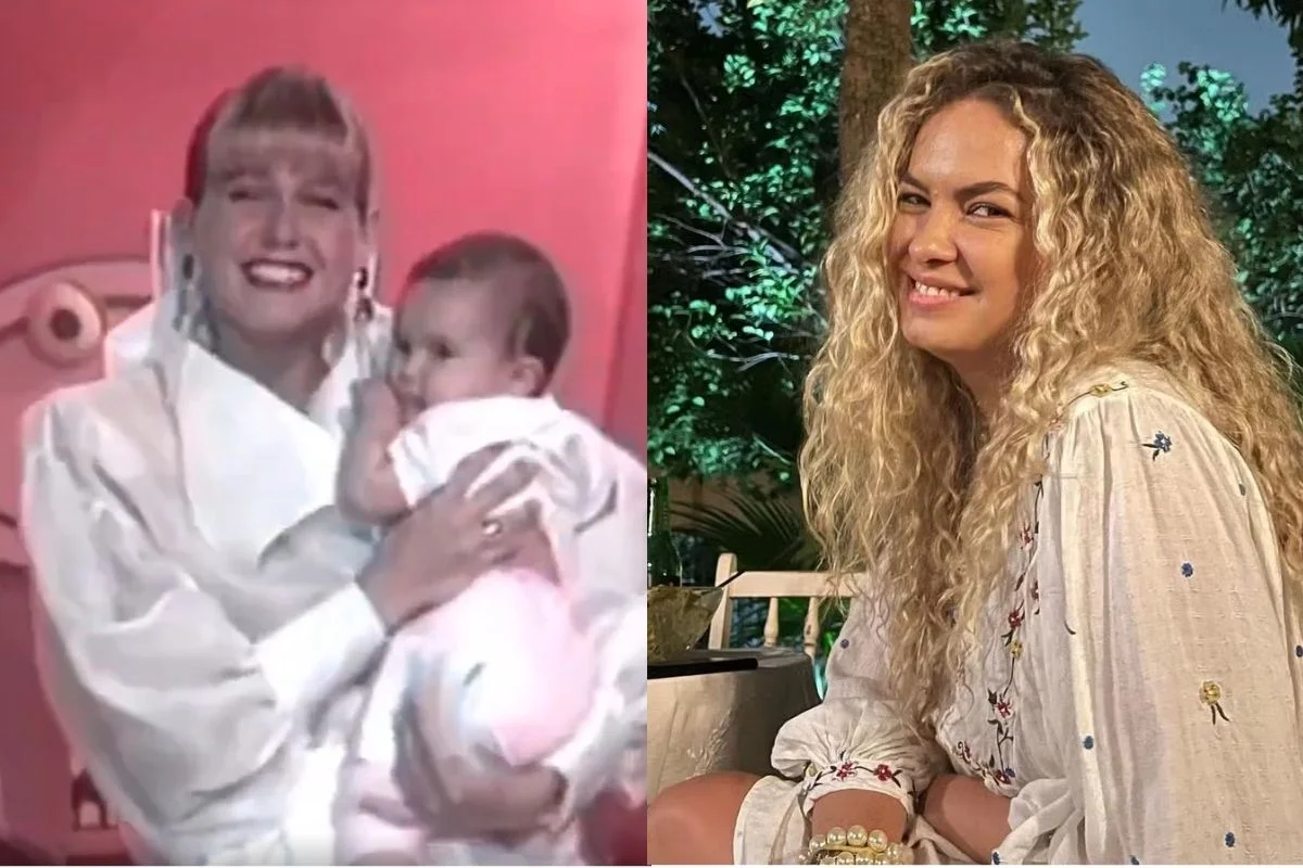 Xuxa segura Lua Blanco bebê no colo durante o Xou da Xuxa