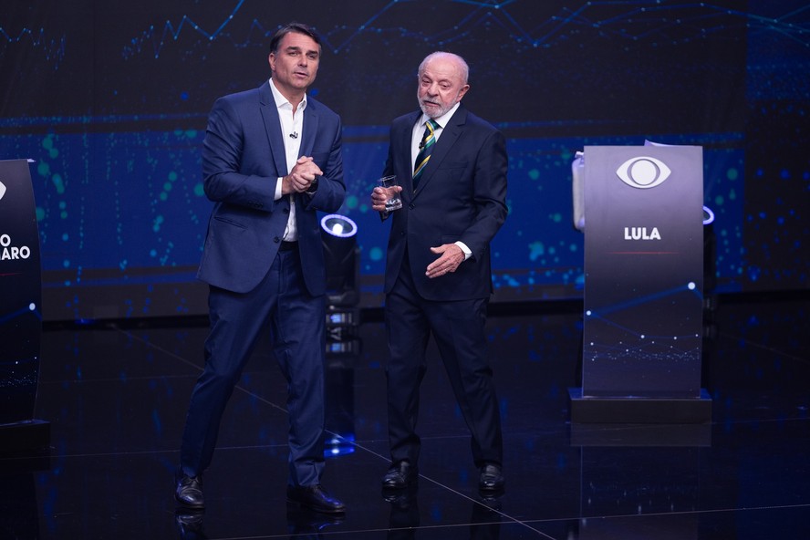 Flávio Bolsonaro e Lula no debate presidencial da Band