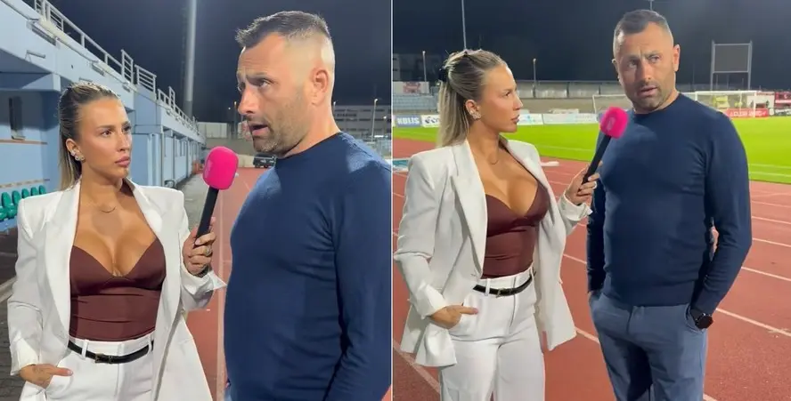 David Oulehla durante entrevista com Sabina Jakšová à beira do campo