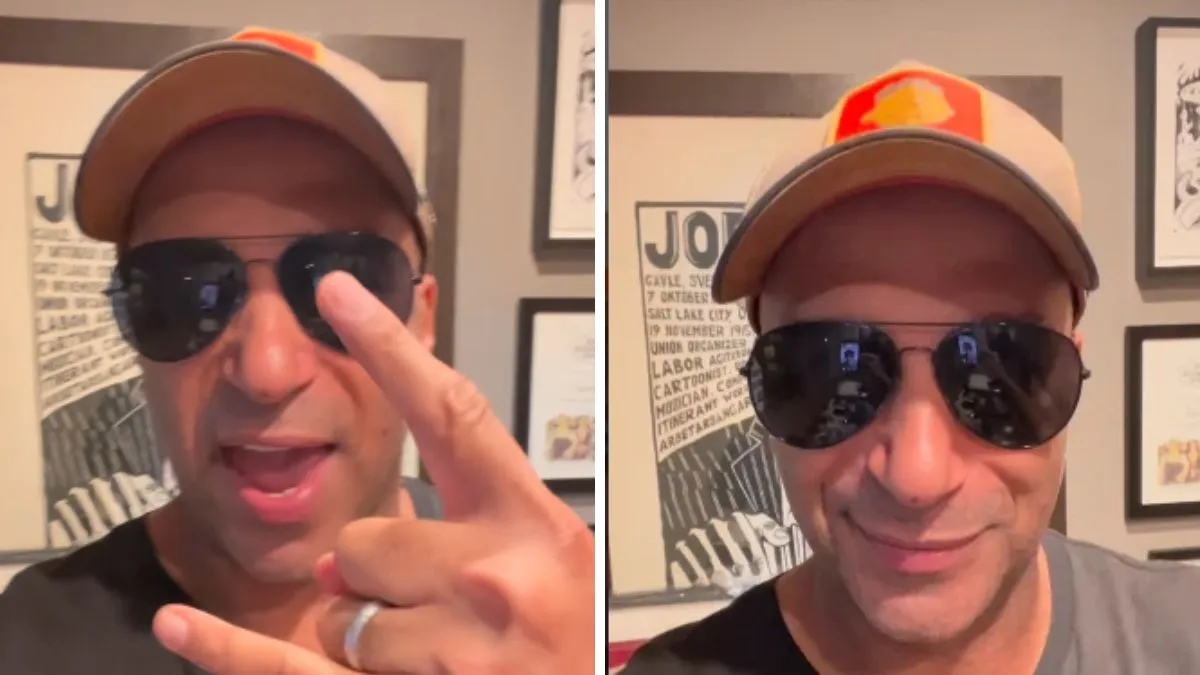 Tom Morello com boné e óculos escuros em vídeo